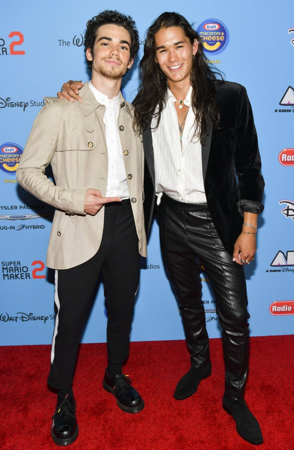 Cameron Boyce (left) and fellow actor Booboo Stewart attend the 2019 Radio Disney Music Awards in June 2019. (Getty Images)