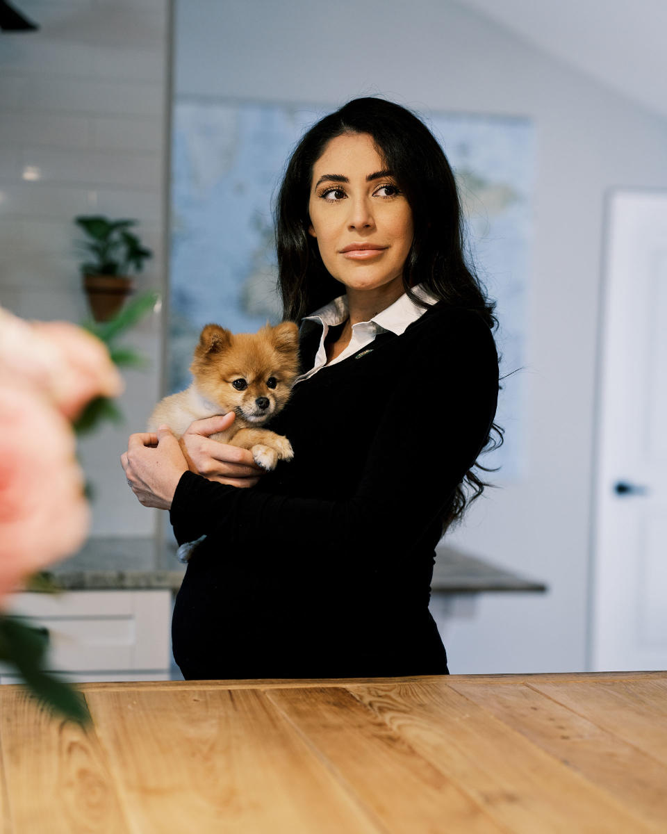 Luna at home in Florida with her dog, Juju on July 6.<span class="copyright">Zack Wittman for TIME</span>