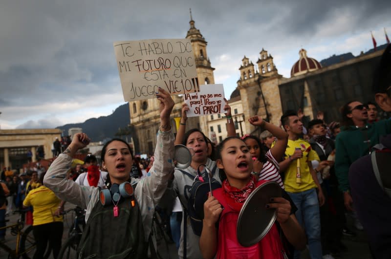 Protester shout slogans during a demonstration on Plaza de Bolivar as the national strike continues, in Bogota