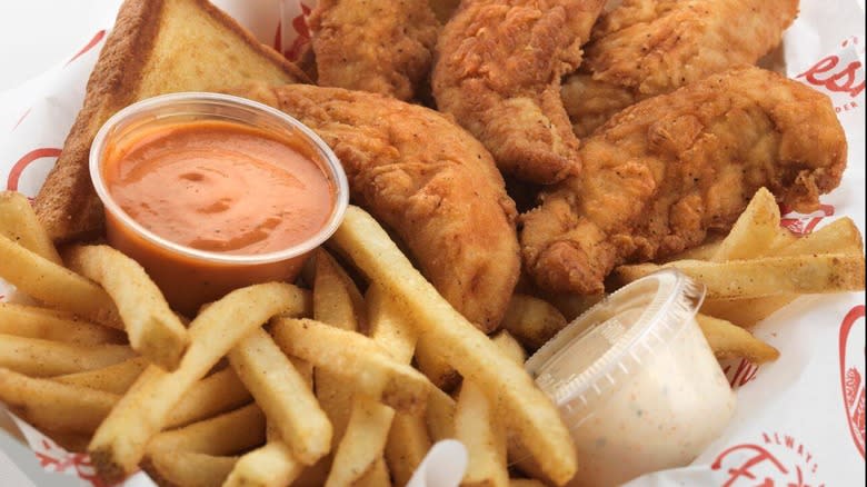 Slim Chickens tenders fries and sauces