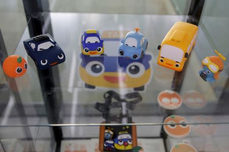 Didi Chuxing souvenirs are displayed at its headquarters in Beijing, China, May 18, 2016. REUTERS/Kim Kyung-Hoon