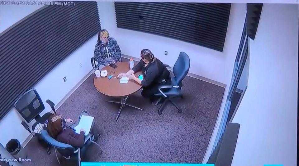 PHOTO: In a video showing during her trial on Feb. 27. 2024, Hannah Gutierrez (in the blue mask) is seen being interviewed at the Santa Fe County Sheriff's Office on Oct. 21, 2021. (KOAT)