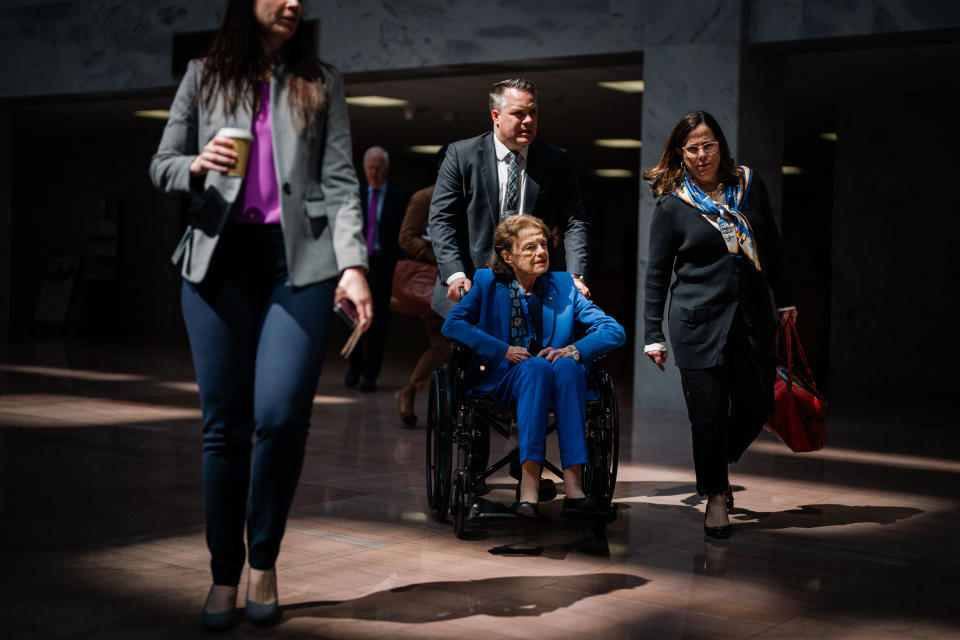 Sen. Dianne Feinstein talks with Nancy Corinne Prowda, daughter of Rep. Nancy Pelosi, D-Calif., on May 18.