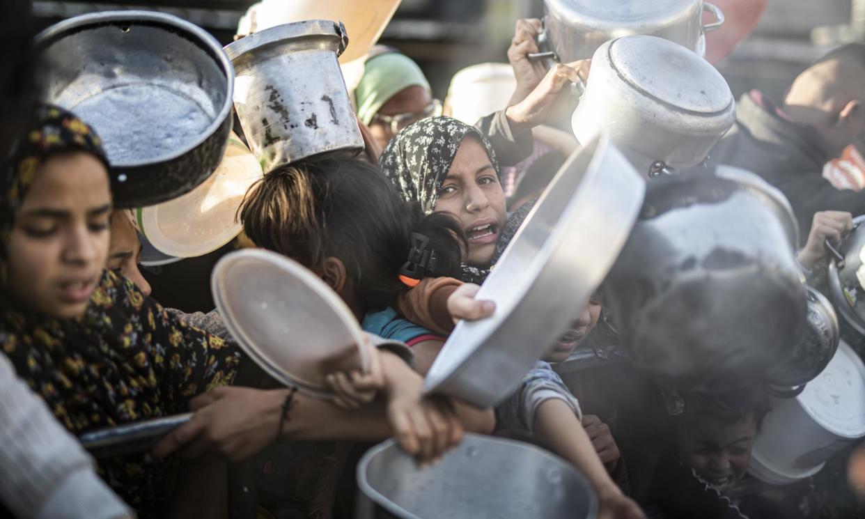 <span>The entire population of the Gaza Strip, more than 2 million people, is facing ‘high levels of acute food insecurity’.</span><span>Photograph: Anadolu/Getty Images</span>