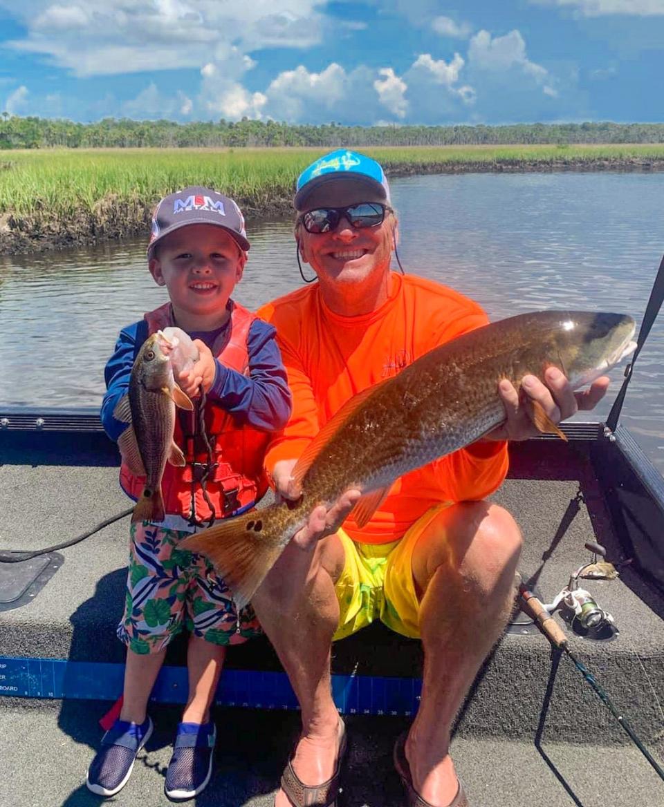 Brayden Roundtree caught his first redfish while fishing with his “papa”, Roger Rountree.
