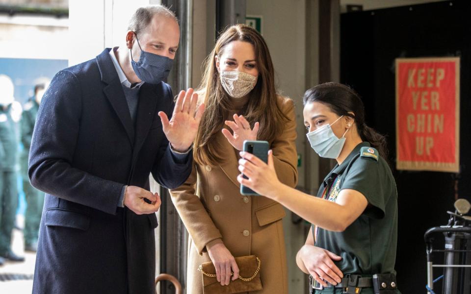 The Duke and Duchess of Cambridge chat to a paramedic's father in Bangladesh - PA/Richard Pohle