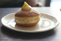 Skip dinner and go straight to dessert at Fratelli Paradiso, their custard filled doughnut is the most popular dish on the menu. The soft pillow of goodness is, well, filled with custard, dusted with icing sugar and then topped with another generous dollop of custard.