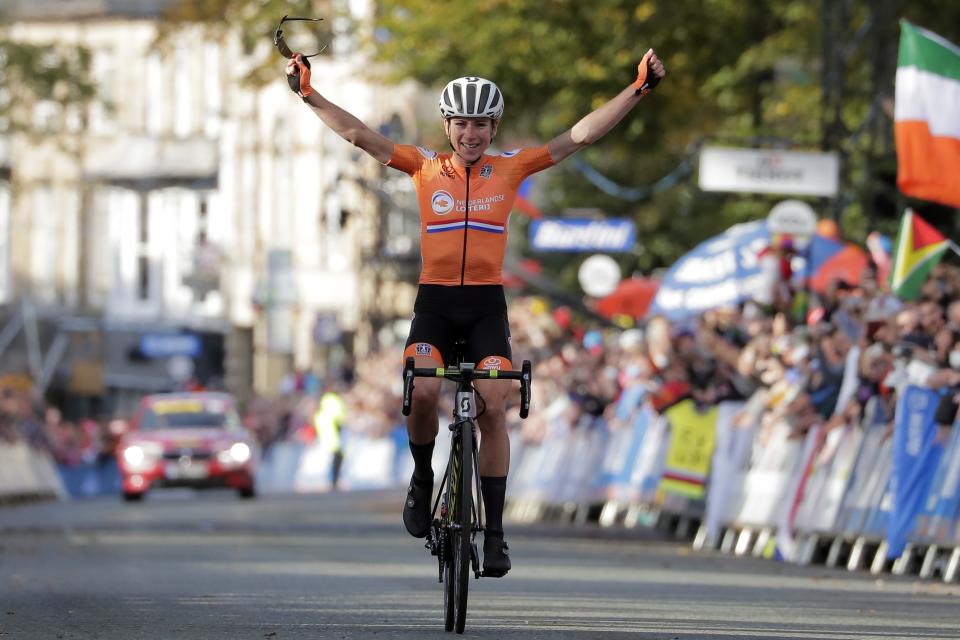 Annemiek van Vleuten, of The Netherlands, celebrates as she crosses the finish line to win the women elite race, at the road cycling World Championships in Harrogate, England, Saturday, Sept. 28, 2019. (AP Photo/Manu Fernandez)