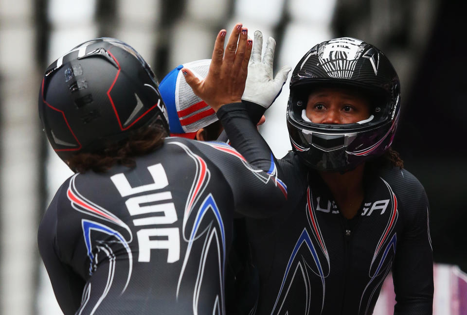 Elana Meyers (left) and Lauryn Williams of the United States team 1 celebrate during the Women's Bobsleigh at the Sochi 2014 Winter Olympics in Russia. Alex Livesey—Getty Images