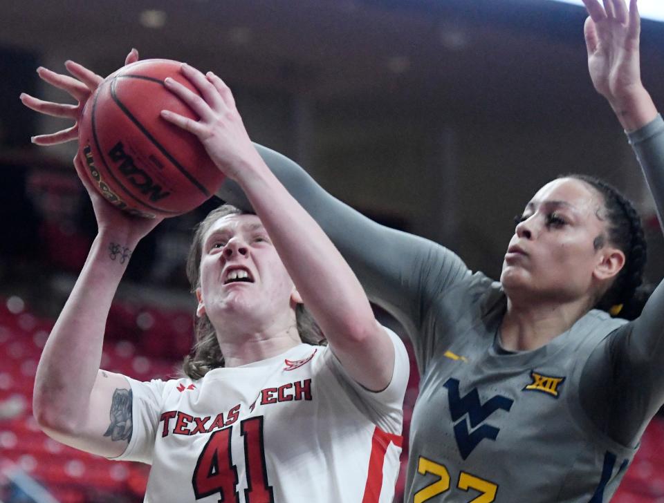 Texas Tech's guard Katie Ferrell (41) looks to shoot a lay up against West Virginia in a Big 12 women's basketball game, Wednesday, Feb. 22, 2023, at United Supermarkets Arena.