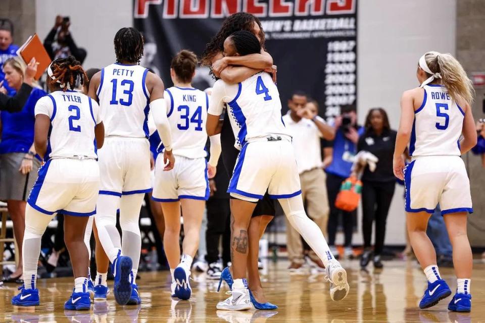 Eniya Russell received a hug from Kentucky head coach Kyra Elzy after making what turned out to be the game-winning basket against Boston College at Transylvania University’s Clive M. Beck Center on Thursday night.