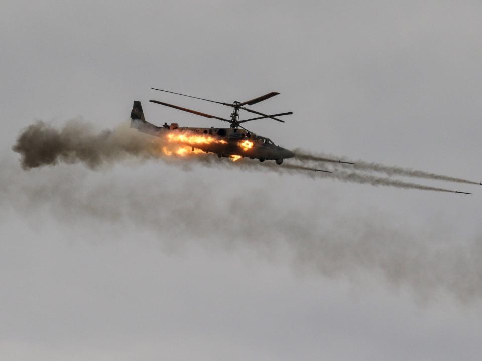 A helicopter firing while in flight.