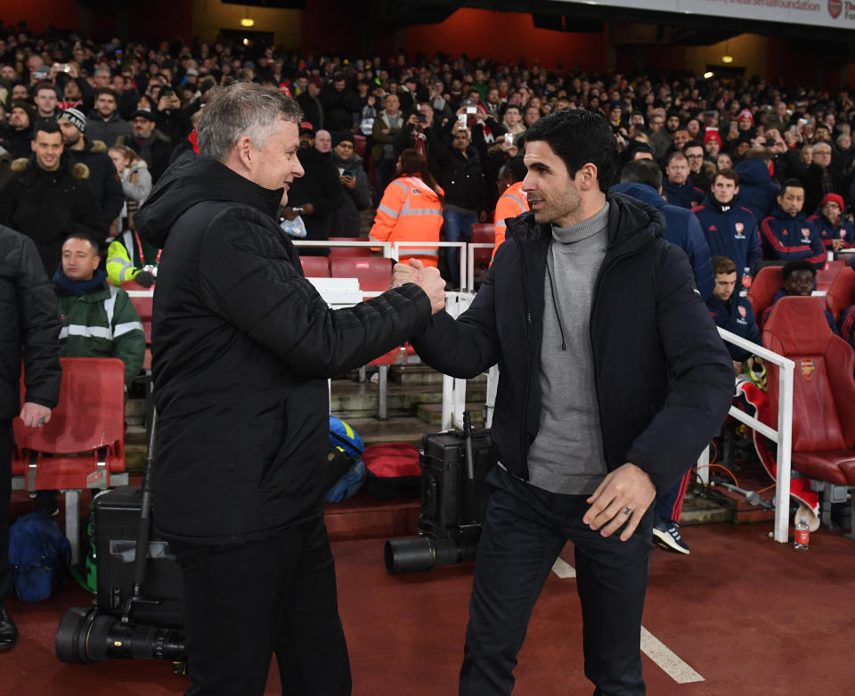 LONDON, ENGLAND - JANUARY 01: Mikel Arteta the Arsenal Head Coach greets Ole Gunnar Solskjaer the Manager of Man Utd before the Premier League match between Arsenal FC and Manchester United at Emirates Stadium on January 01, 2020 in London, United Kingdom. (Photo by David Price/Arsenal FC via Getty Images)