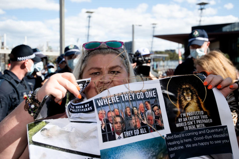 A protester holds a sign up during the Freedom Day Rally in Sydney on Sept. 5, 2020.<span class="copyright">Speed Media/Icon Sportswire/Getty Images</span>