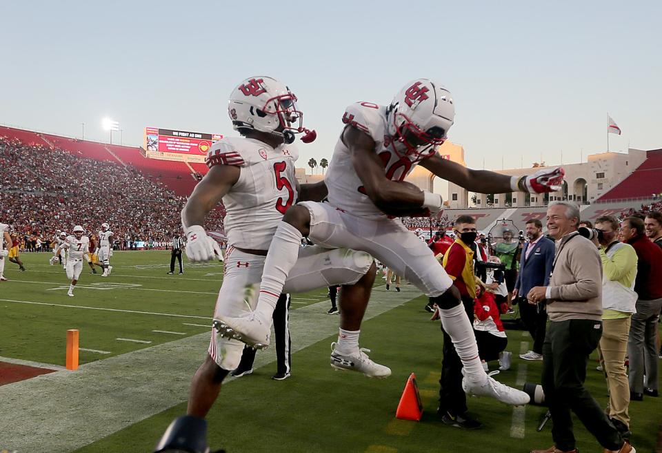 Utah wide receiver receiver Money Parks (10) celebrates after scoring a first-half touchdown Oct. 9, 2021.