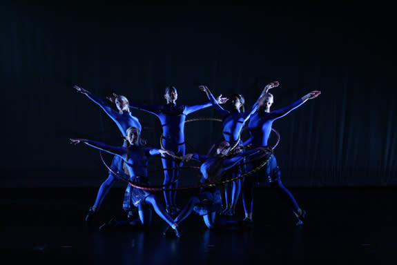 Using hoops, AstroDance dancers present an abstract representation of Black Holes merging.