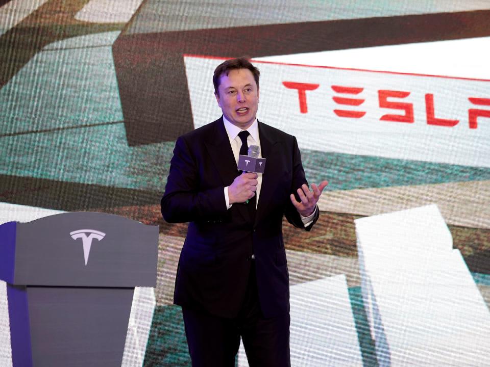 FILE PHOTO: Tesla Inc CEO Elon Musk speaks at an opening ceremony for Tesla China-made Model Y program in Shanghai, China January 7, 2020. REUTERS/Aly Song/File Photo