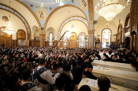 Mourners gather for the funeral of Coptic Christians who were killed in an attack, at the Prince Tadros Church in Minya, Egypt, November 3, 2018. REUTERS/Mohamed Abd El Ghany