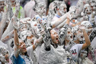 <p>Students from St Andrews University indulge in a tradition of covering themselves with foam to honor the “academic family” on Lower College Lawn on Oct. 23, 2017, in St Andrews, Scotland. (Photo: Jeff J Mitchell/Getty Images) </p>