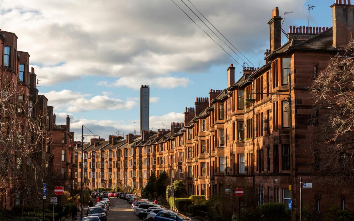 Traditional old gothic tenemant houses at street of glasgow Scotland