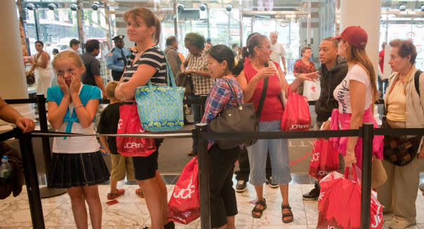 Shoppers at the JCPenney store in New York participate in a Paul Frank and Julius back-to-school promotion