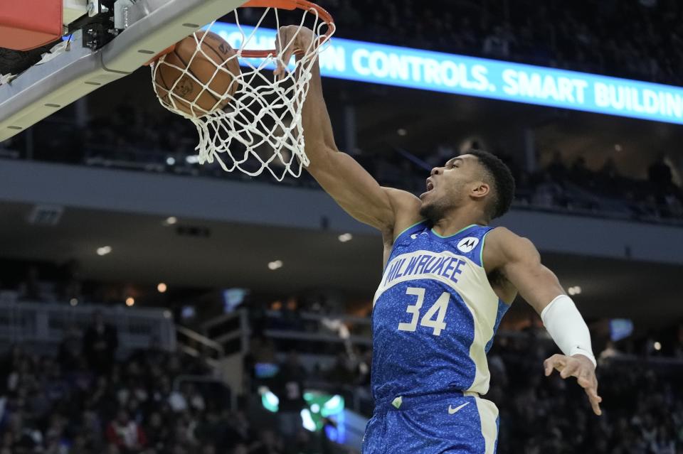 Milwaukee Bucks' Giannis Antetokounmpo dunks during the second half of an NBA basketball game against the New York Knicks Tuesday, Dec. 5, 2023, in Milwaukee. The Bucks won 146-122. (AP Photo/Morry Gash)