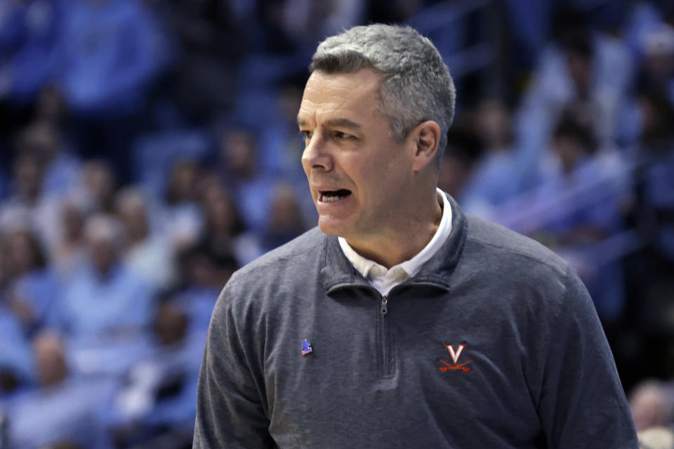 Virginia coach Tony Bennett watch the team's play against North Carolina during the second half of an NCAA college basketball game Saturday, Feb. 25, 2023, in Chapel Hill, N.C. (AP Photo/Chris Seward)