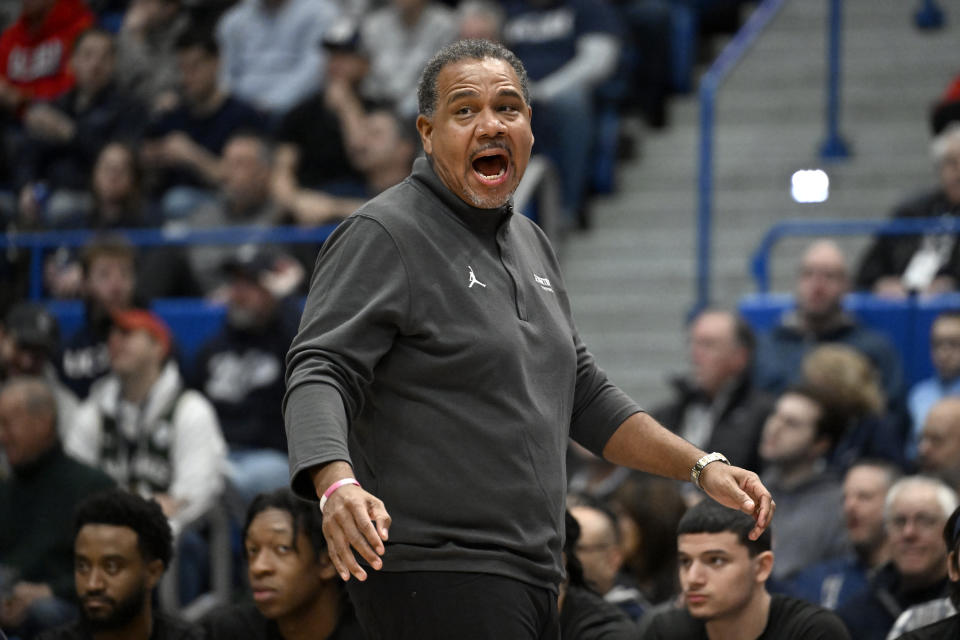 Georgetown head coach Ed Cooley calls out to his team in the first half of an NCAA college basketball game against UConn, Sunday, Jan. 14, 2024, in Hartford, Conn. (AP Photo/Jessica Hill)