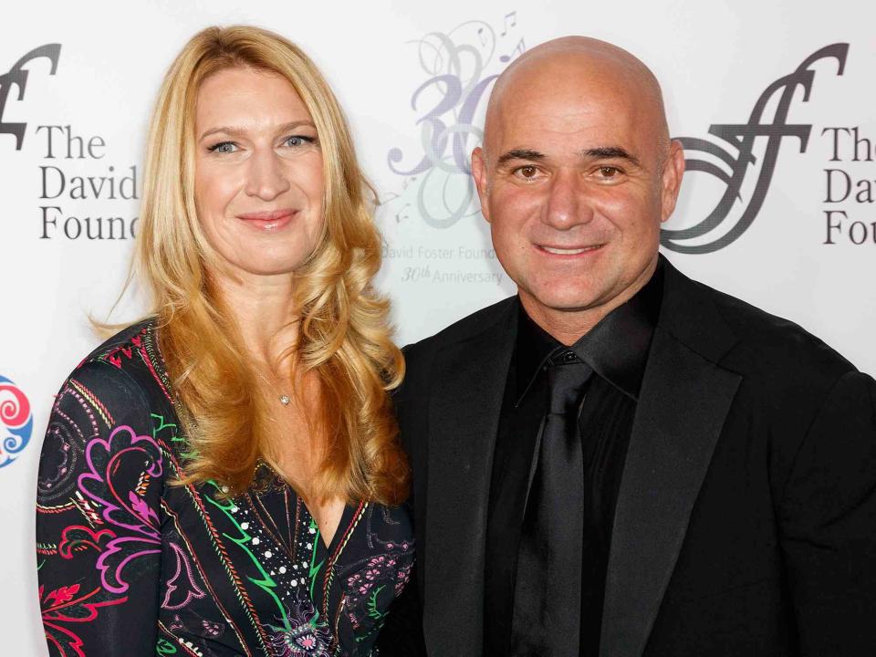 <p>Andrew Chin/Getty</p> Steffi Graf and Andre Agassi arrive for the David Foster Foundation Gala in 2017
