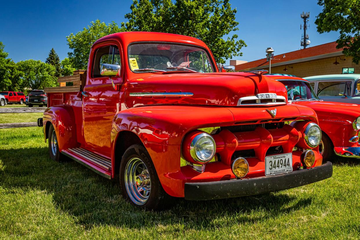 Falcon Heights, MN - June 17, 2022: Low perspective front corner view of a 1951 Ford F3 Pickup Truck at a local car show.