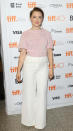 <p>Saoirse Ronan broke the white after Labor Day rule in the best way wearing white wide-legged pants with a pink sweater from Chanel’s Resort 2016 collection.</p>