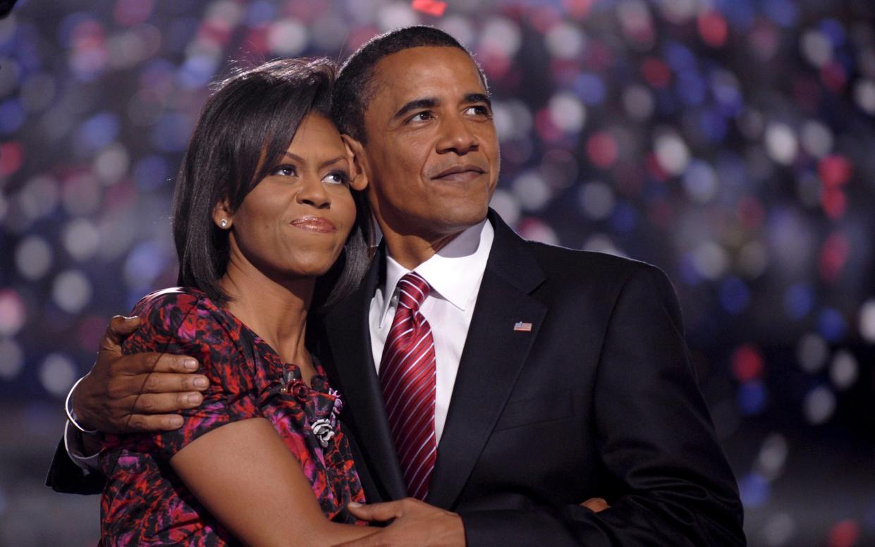 Michelle and Barack Obama in 2008 - SHAWN THEW/EPA