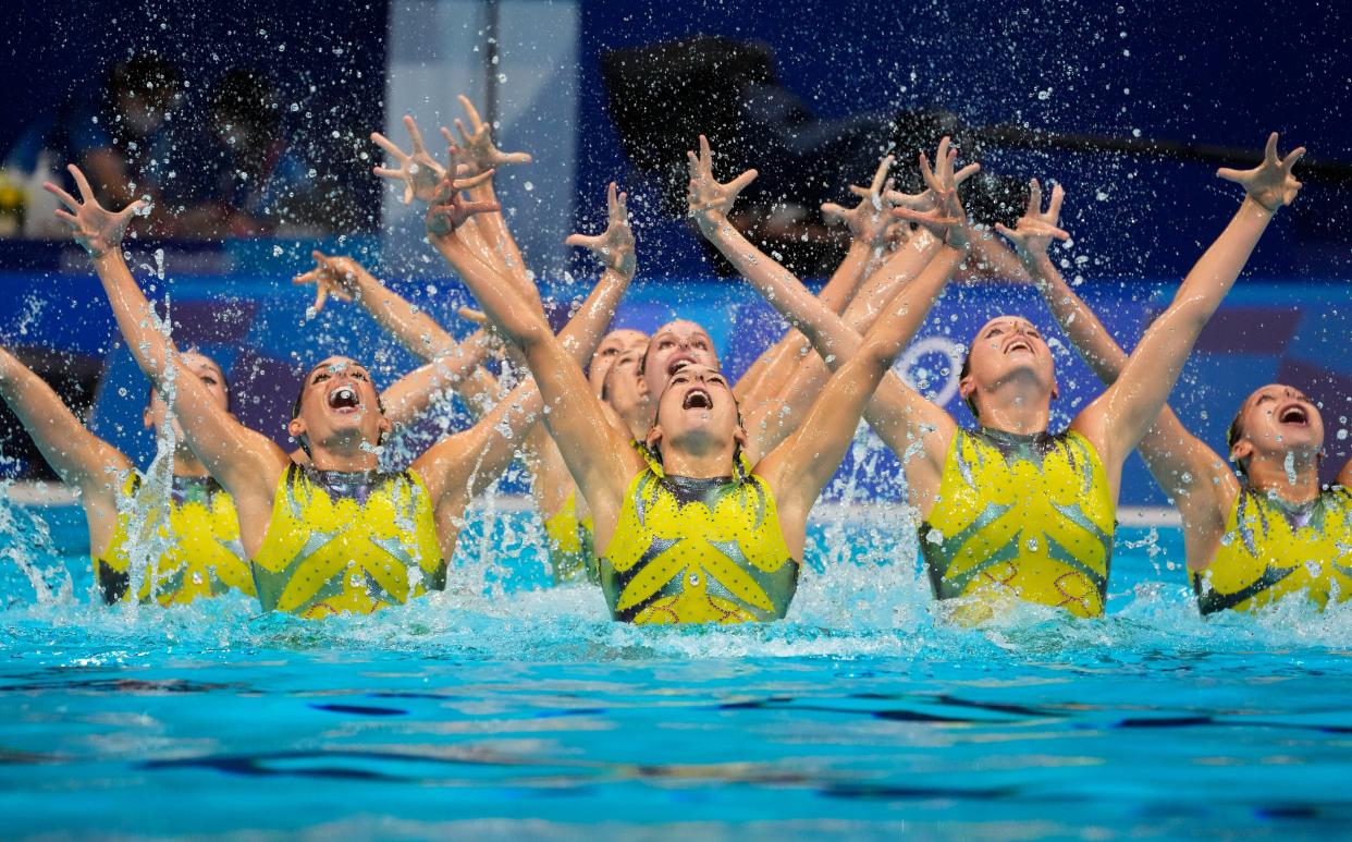 Spain's team compete in artistic swimming team, free routine at the 2020 Summer Olympics, Saturday, Aug. 7, 2021, in Tokyo, Japan. (AP Photo/Dmitri Lovetsky)