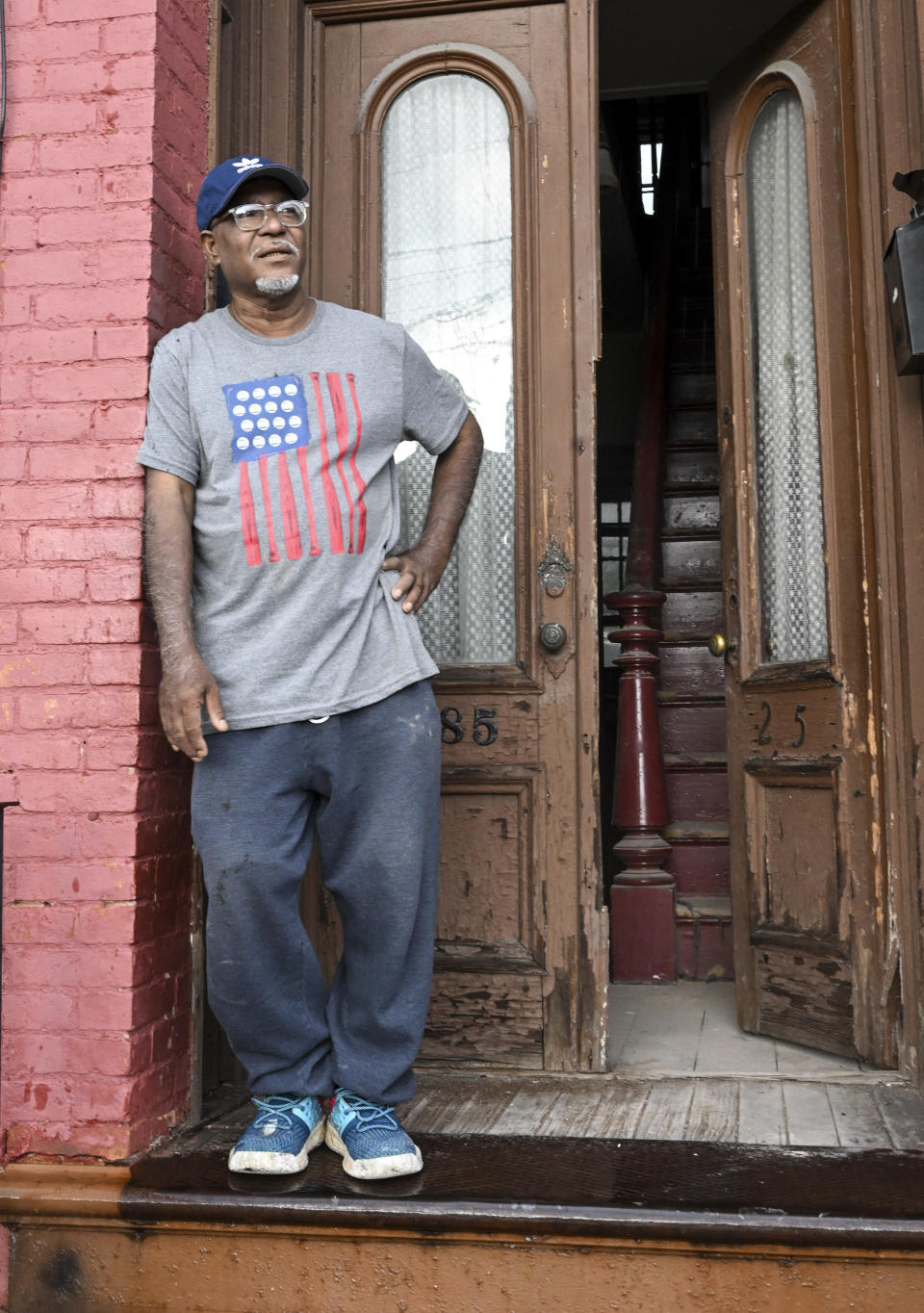 Former pizza shop owner Mohammed Hossain, who was arrested by federal authorities in 2004 as part of a counter-terrorism sting and sentenced to 15 years in jail, talks about his time in prison and the rehabbing work he is doing on his rental property, Monday, July 31, 2023, in Albany, N.Y. Hossain and Albany mosque leader Yassin Aref were arrested as part of a fictitious plot to launder money from the sale of a shoulder-fired missile. Convicted in 2006, both men are out of prison and maintain their innocence. (AP Photo/Hans Pennink)