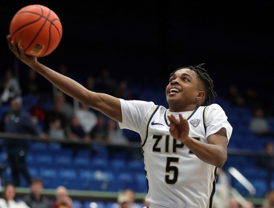 Akron Zips guard Tavari Johnson looks for a layup during the first half, Friday, Jan. 5, 2024.