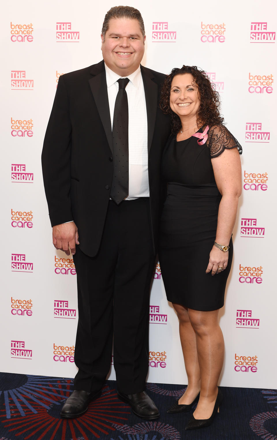 Jonathan and Nikki Tapper from GoggleBox attend Breast Cancer Care's London fashion show at Grosvenor House Hotel to launch Breast Cancer Awareness Month, on October 7, 2015 in London, England.  (Photo by Tabatha Fireman/Getty Images for Breast Cancer Care)
