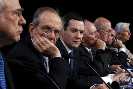 OECD Secretary General Jose Angel Gurria, Italy's Finance Minister Pier Carlo Padoan, Britain's Chancellor of the Exchequer George Osborne, Germany's Finance Minister Wolfgang Schaeuble, France's Finance Minister Michel Sapin, Spain's Finance Minister Luis de Guindos and International Monetary Fund (IMF) Managing Director Christine Lagarde attend a news conference at the IMF/World Bank Spring Meetings in Washington April 14, 2016. REUTERS/Jonathan Ernst