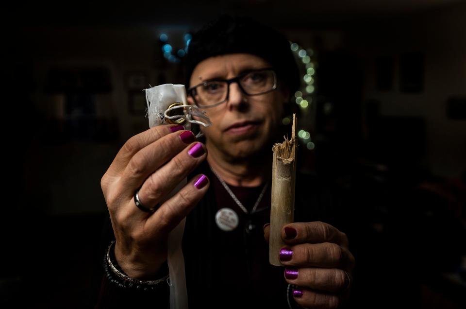 Quinn Doner of Milton holds up what is left of their family's Black Lives Matter flag that was ripped down from the front steps of their home in November 2019. It's not the first time they've been vandalized and, Doner suspects, it also won't be the last. Doner identifies as a non-binary trans woman, who uses the pronouns they/them, supports the Black Lives Matter movement, LGBTQ rights, and other progressive causes. Doner believes they've been targeted for the flag and for their gender identity.