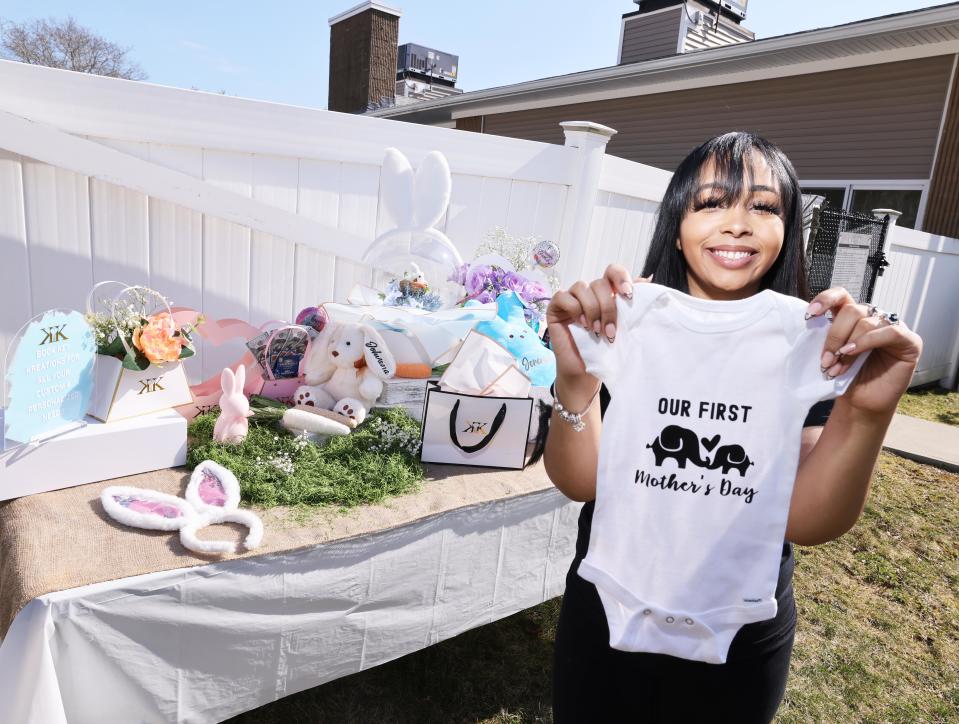 Kianna Marques designs items at her Brockton home on Wednesday, March 13, 2024.