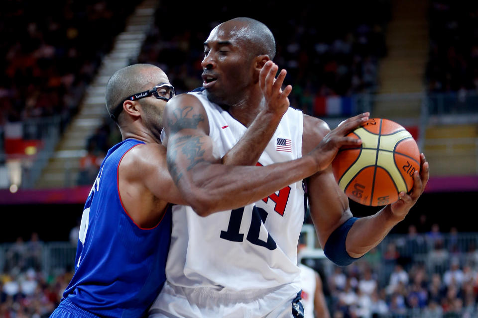 LONDON, ENGLAND - JULY 29: Kobe Bryant #10 of United States moves the ball against Tony Parker #9 of France in the Men's Basketball Game on Day 2 of the London 2012 Olympic Games at the Basketball Arena on July 29, 2012 in London, England. (Photo by Jamie Squire/Getty Images)