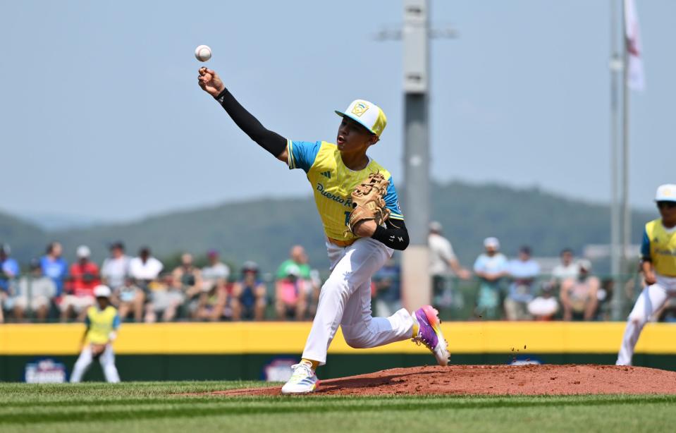 Aug 15, 2024; Williamsport, PA, USA; Puerto Rico pitcher Fernando Santos (12) throws against Japan in the first inning at Volunteer Stadium. Mandatory Credit: Kyle Ross-USA TODAY Sports