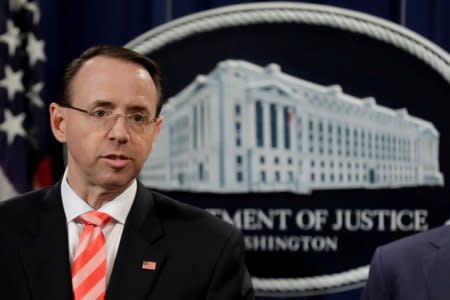 FILE PHOTO: U.S. Deputy Attorney General Rod Rosenstein speaks at a news conference with other law enforcement officials at the Justice Department to announce nine Iranians charged with conducting massive cyber theft campaign, in Washington, U.S., March 23, 2018. REUTERS/Yuri Gripas/File Photo