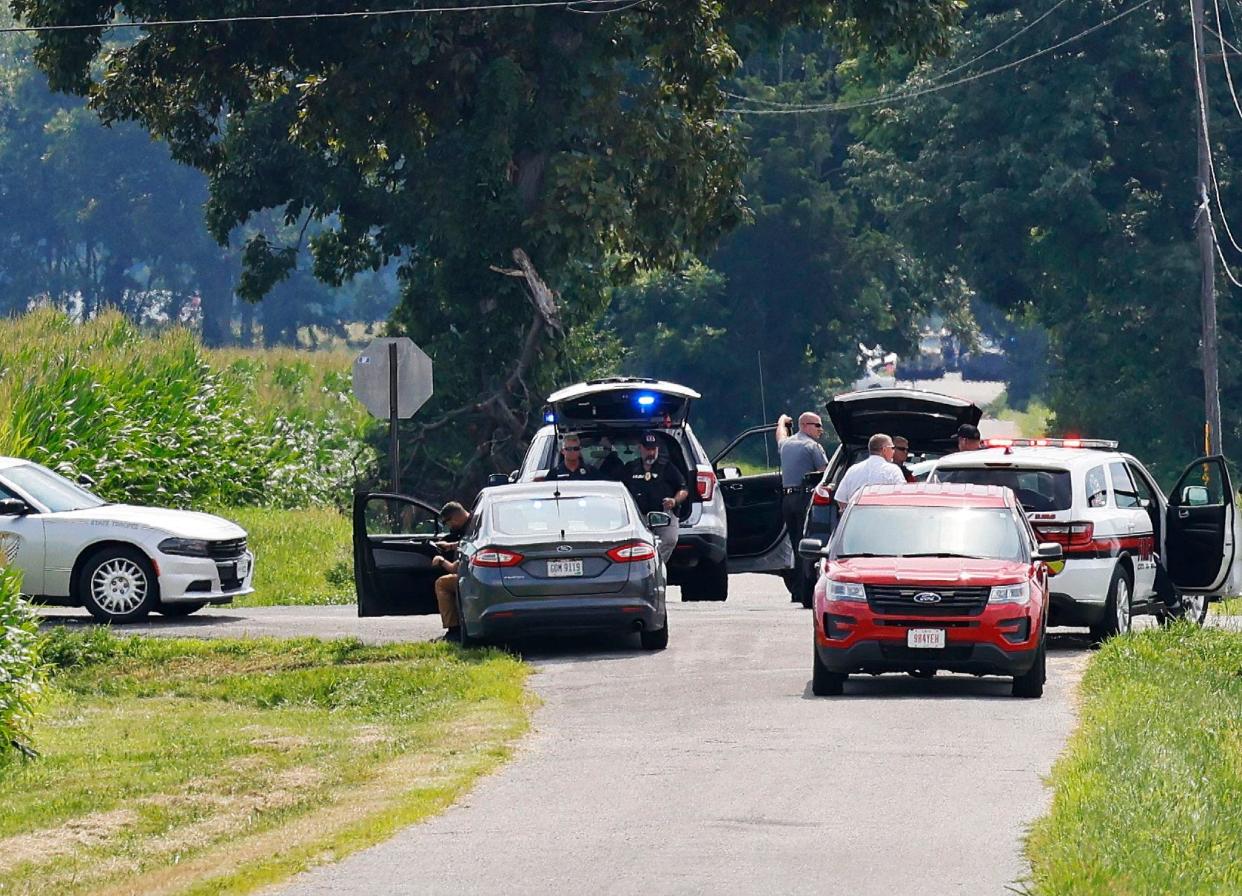 The area near Center and Smith roads was closed for hours during a standoff Thursday, Aug. 11, 2022, in Clinton County, Ohio, after an armed man tried to breach the FBI's Cincinnati office and fled north on te highway.