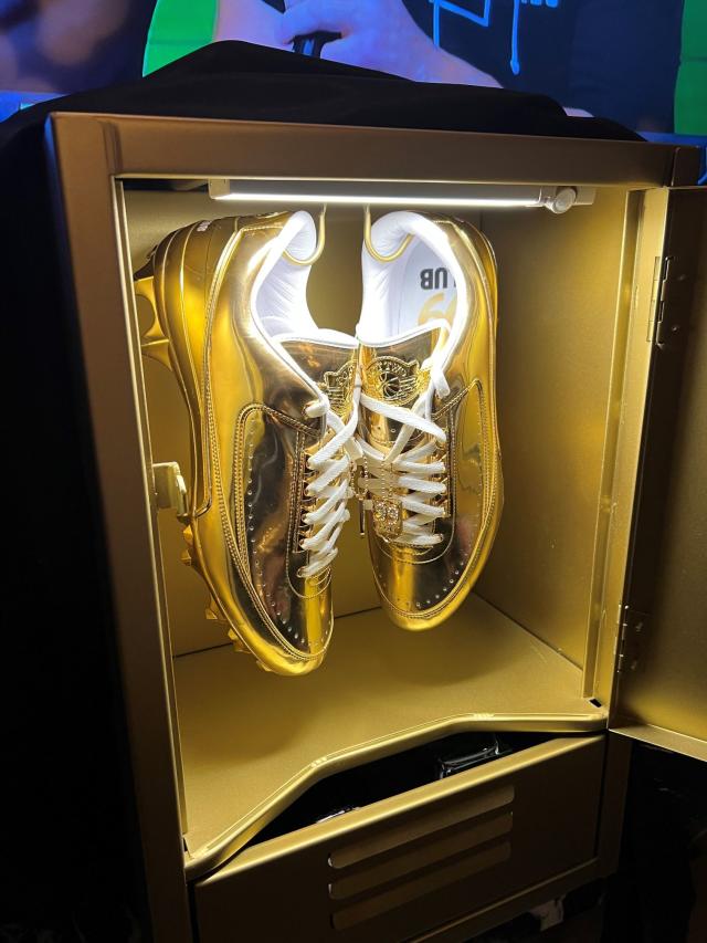 gold jordan cleats