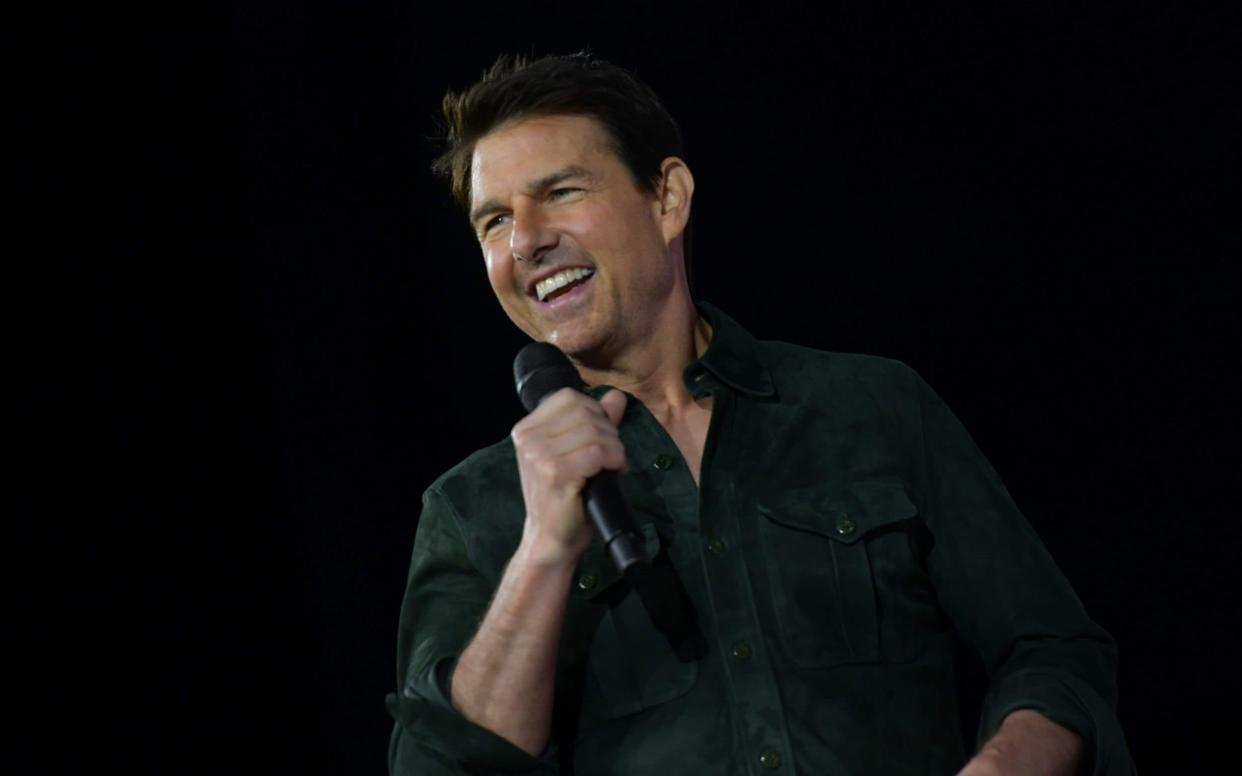 Actor Tom Cruise makes a surprise appearance in Hall H to promote Top Gun: Maverick at the Convention Center during Comic Con in San Diego - AFP