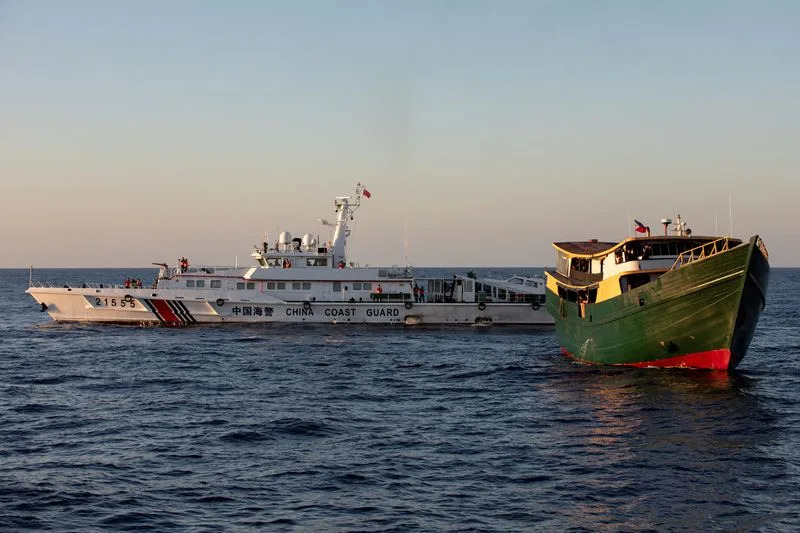 A Chinese Coast Guard vessel blocks the Philippine resupply vessel Unaizah May 4, on its way to a resupply mission at Second Thomas Shoal in the South China Sea