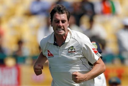 Cricket - India v Australia - Fourth Test cricket match - Himachal Pradesh Cricket Association Stadium, Dharamsala, India - 27/03/17 - Australia's Pat Cummins celebrates after dismissing India's Ravindra Jadeja. REUTERS/Adnan Abidi