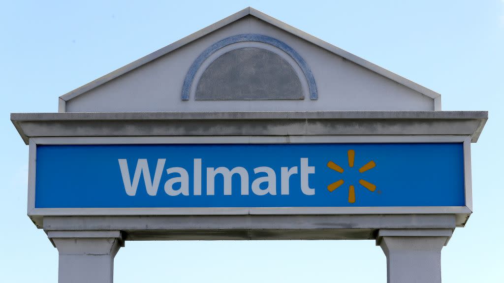 Walmart's blue sign on an archway
