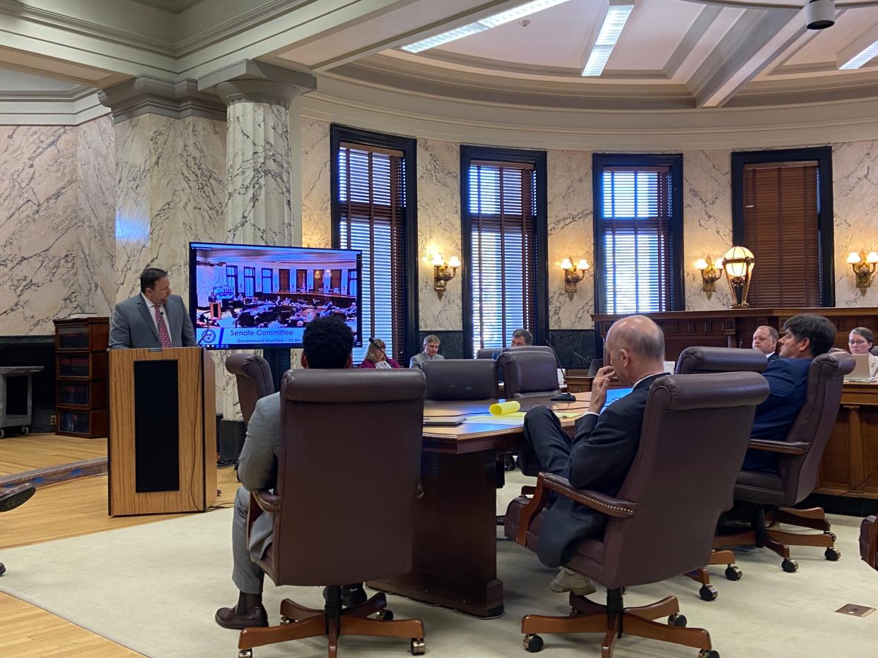 Public Employment Retirement System of Mississippi board member Jay Smith, left, speaks with lawmakers Wednesday during a Senate hearing on House Bill 1590 in the Mississippi State Capitol. Smith, as well as other board members, gave updates to lawmakers about why they made the decision to increase contribution rates on public employers, who put money into the state's retirement sytstem.