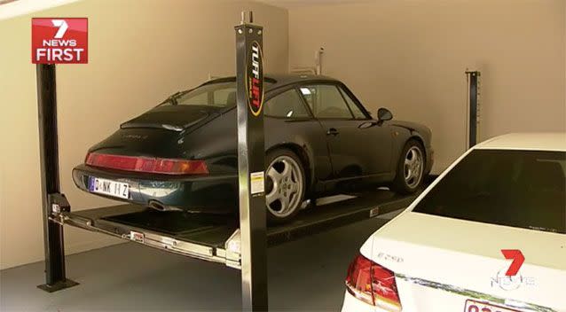 The lift that allows another car to be parked underneath. Source: 7News